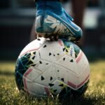 Soccer ball on a stadium pitch