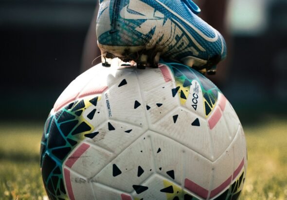 Soccer ball on a stadium pitch