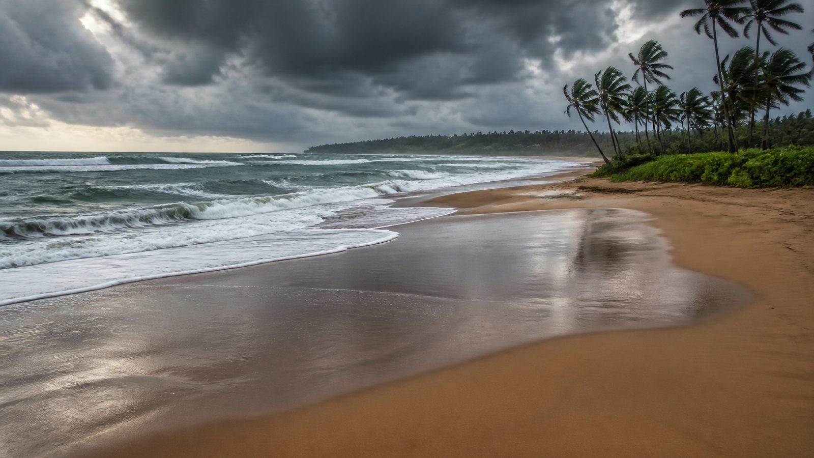 Rough Pacific surf under dark storm clouds on a Hawaiian coast