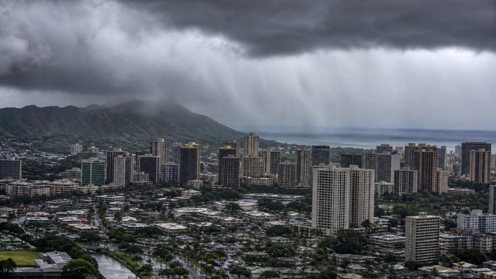 Honolulu skyline under a heavy tropical rainband