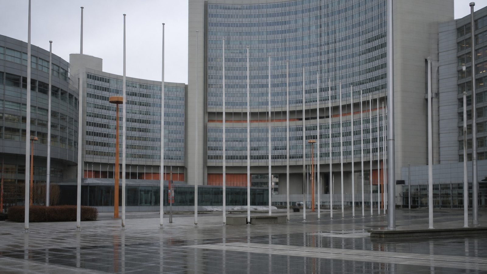 A modern glass conference building in Vienna in daylight