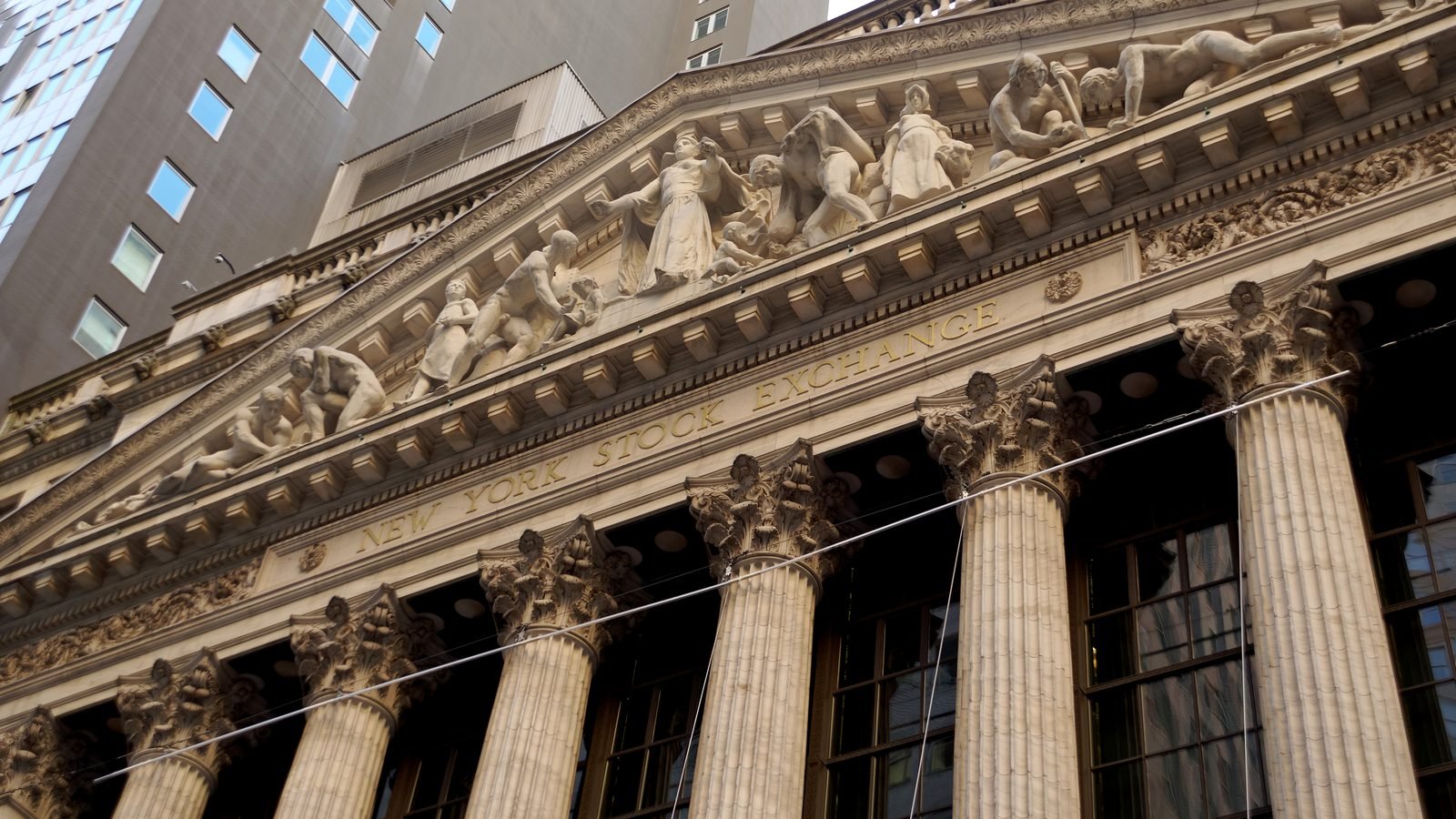 The New York Stock Exchange Broad Street facade. Photograph by Jakub Hałun, CC BY.