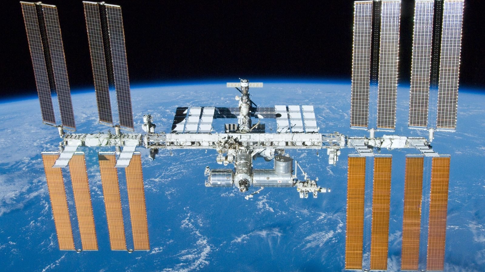The International Space Station after STS-132 undocked, May 23, 2010. NASA / Crew of STS-132 photograph, public domain.