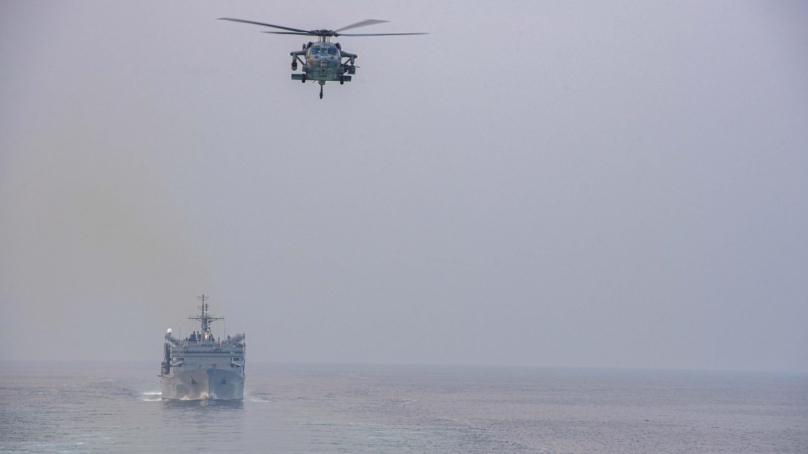 USS Philippine Sea (CG-58) and USNS Supply transiting the Strait of Hormuz, Dec. 14, 2023. U.S. Navy photograph by Petty Officer 3rd Class Janae Chambers, public domain.