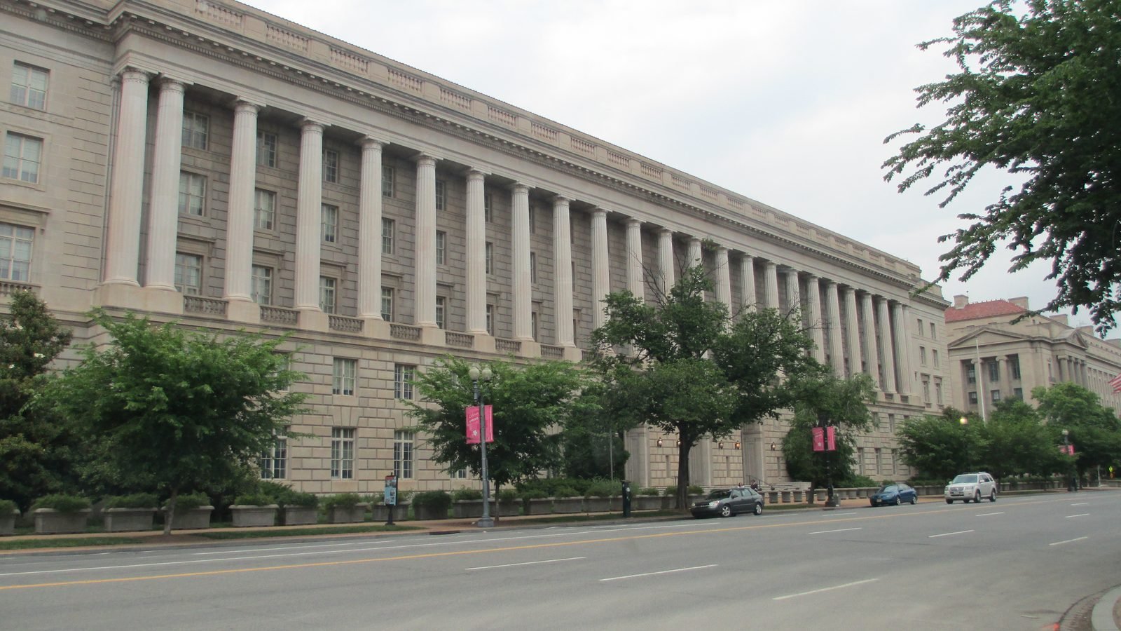 The Internal Revenue Service headquarters on Constitution Avenue in Washington, D.C., including the colonnade and street. Photograph by Joshua Doubek, CC BY-SA.